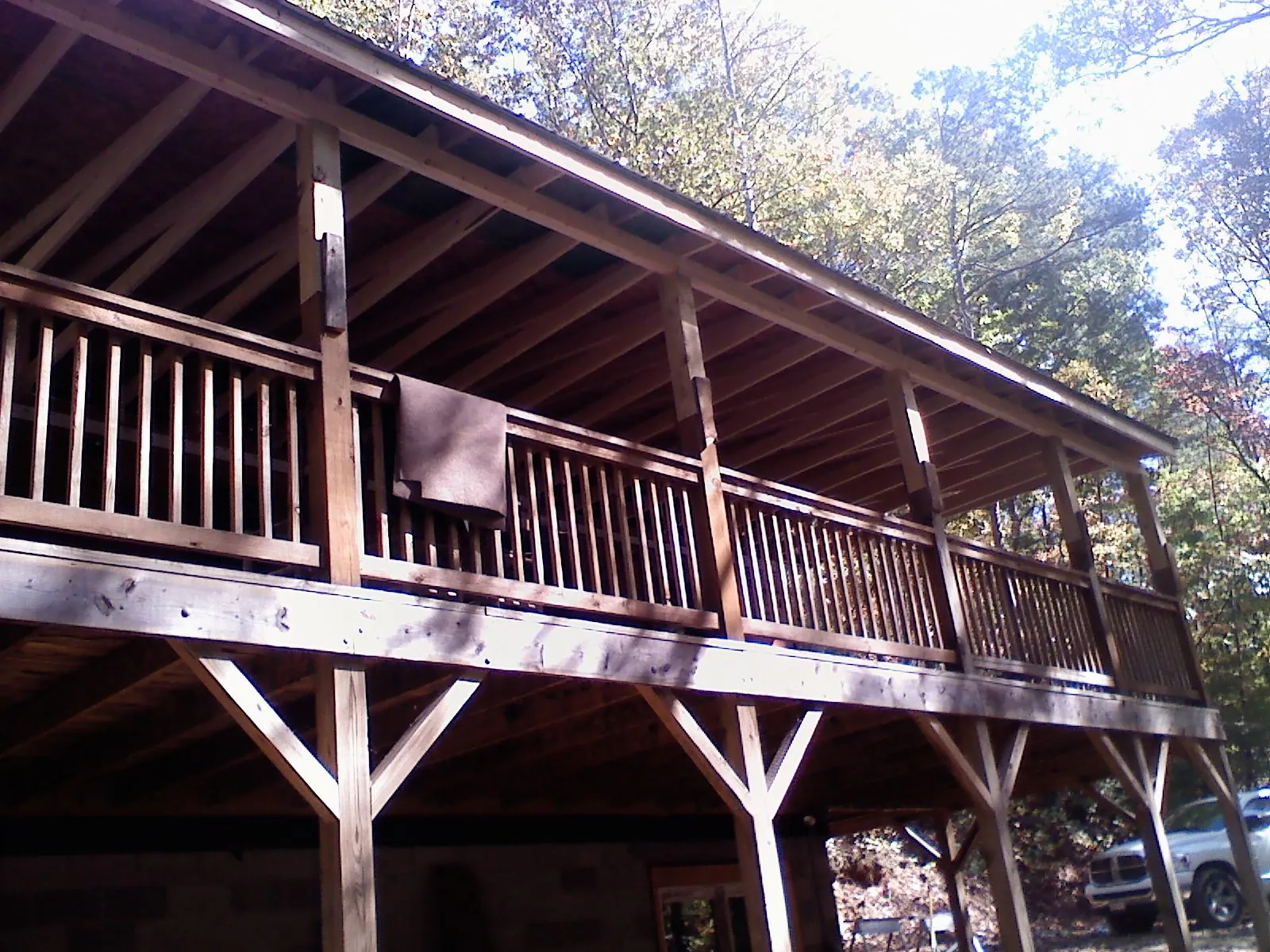 Timber framing under a new elevated porch and deck — Roof Leak Repair in Sunderland by Roofing Brothers